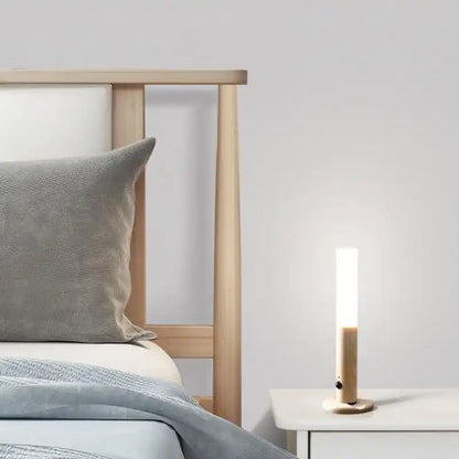 Rechargeable sensor wall light — placed upright as a bedside table lamp